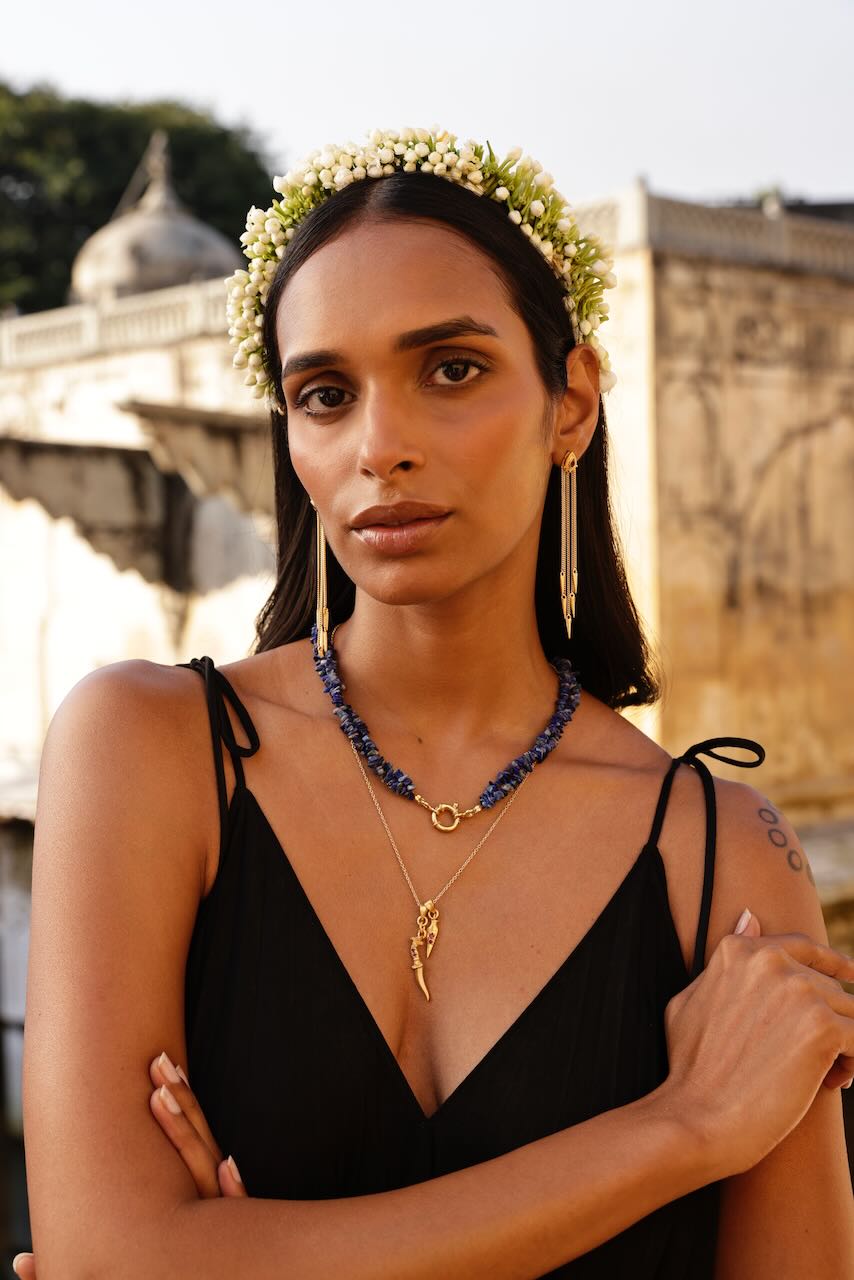 Gold and ruby tassel drop earrings, lapis lazuli twist gem stone necklace and dagger & arrow necklace with rubies.