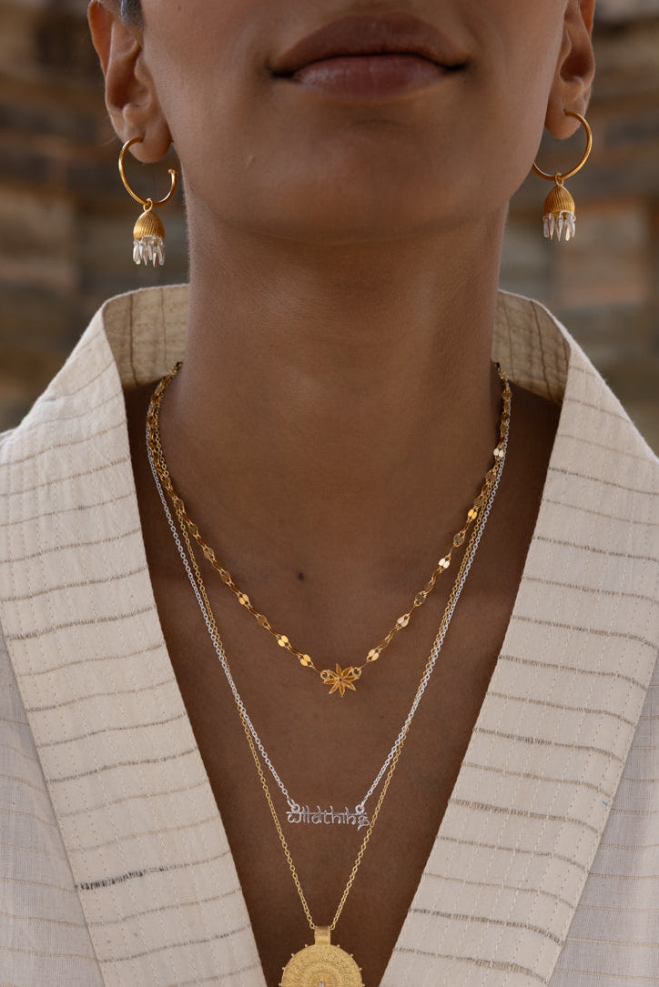 star anise charm choker necklace mirror chain. Jhumka earrings.