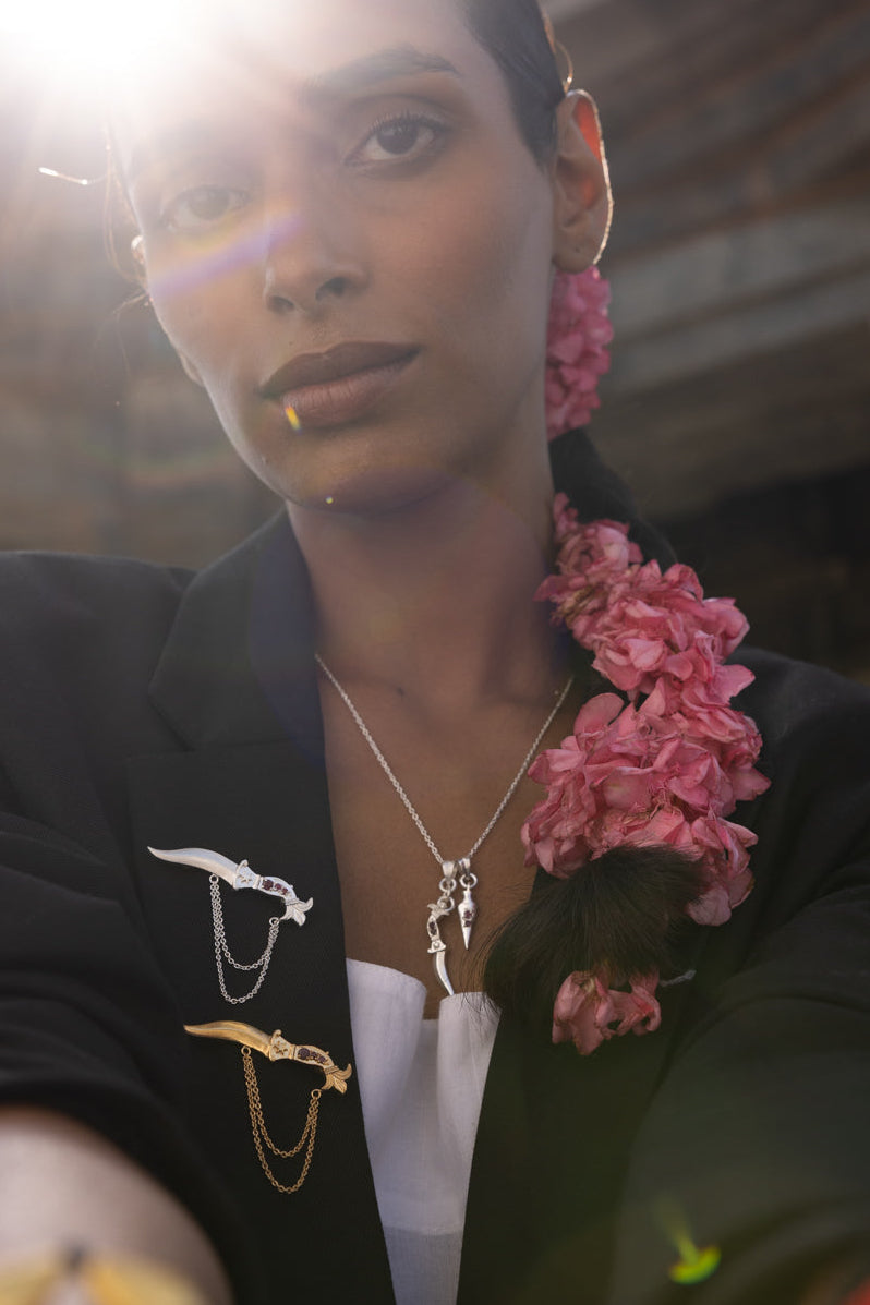 Dagger brooches and dagger & arrow necklace with rubies